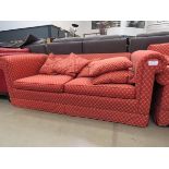 Red floral sofa bed