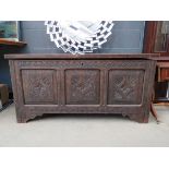 Heavily carved oak coffer