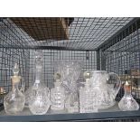 5568 - Cage containing: decanters, sauce bottles, glass jugs and vases