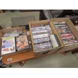 3 boxes containing a qty of DVD's