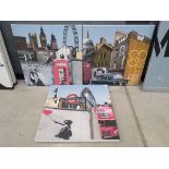 Three Banksy wall hangings