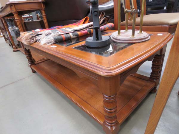 Oak finish coffee table with 3 glass panels