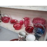 Quantity of red glassware, to include: basket, bowls, jugs and a vaseo