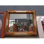 Rectangular mirror in decorative gilt and cream frame