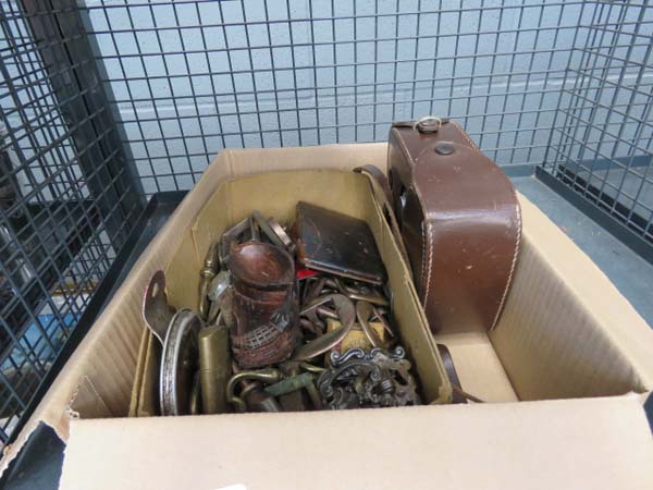 Cage containing: vintage camera metal buckles, handles, die-cast car, razor blades, pens and