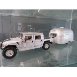 Motor City Classics model of a Hummer and an Airstream caravan