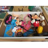 Box containing Mickey and Minnie Mouse telephones, plus a child's doll and a jigsaw puzzle mat