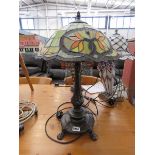 Tiffany style table lamp with green and orange shade