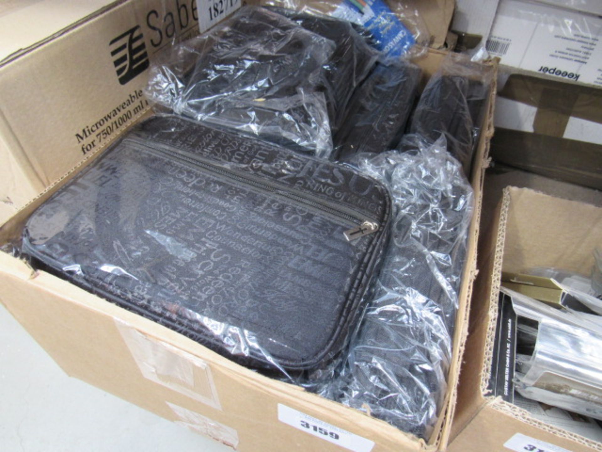 Box containing a quantity of Bible covers