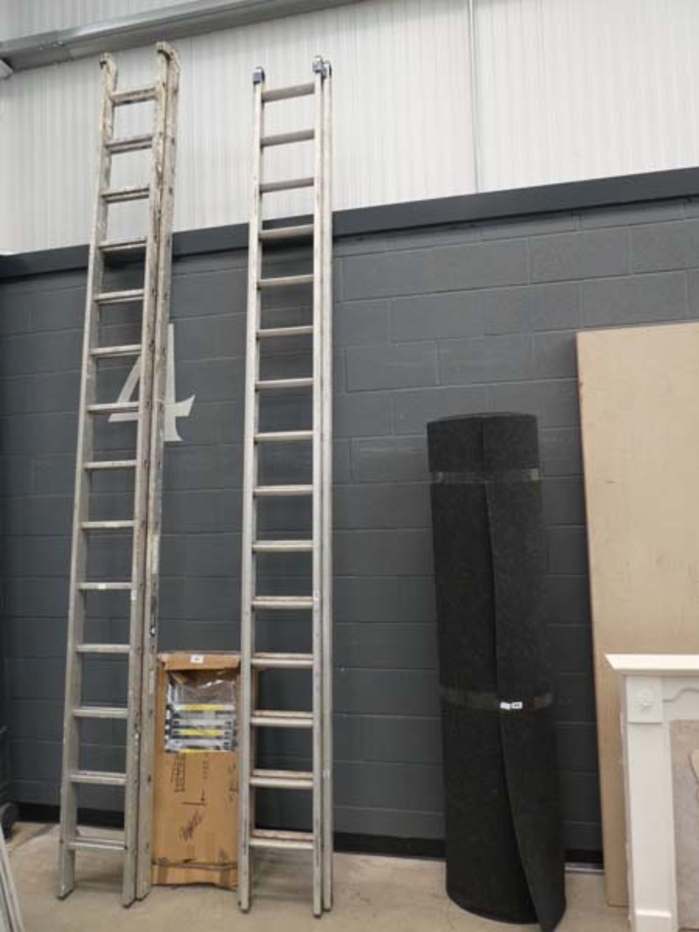 Large set of aluminium double extension ladders