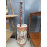 Oriental stick stand, plus a carved African walking stick Good condition