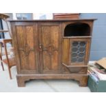 1920's oak sideboard with cupboard and shelf under A stand alone piece
