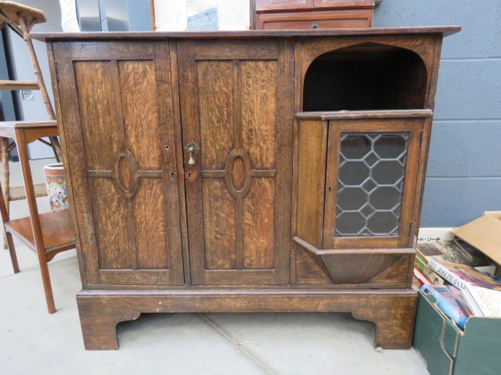 1920's oak sideboard with cupboard and shelf under A stand alone piece