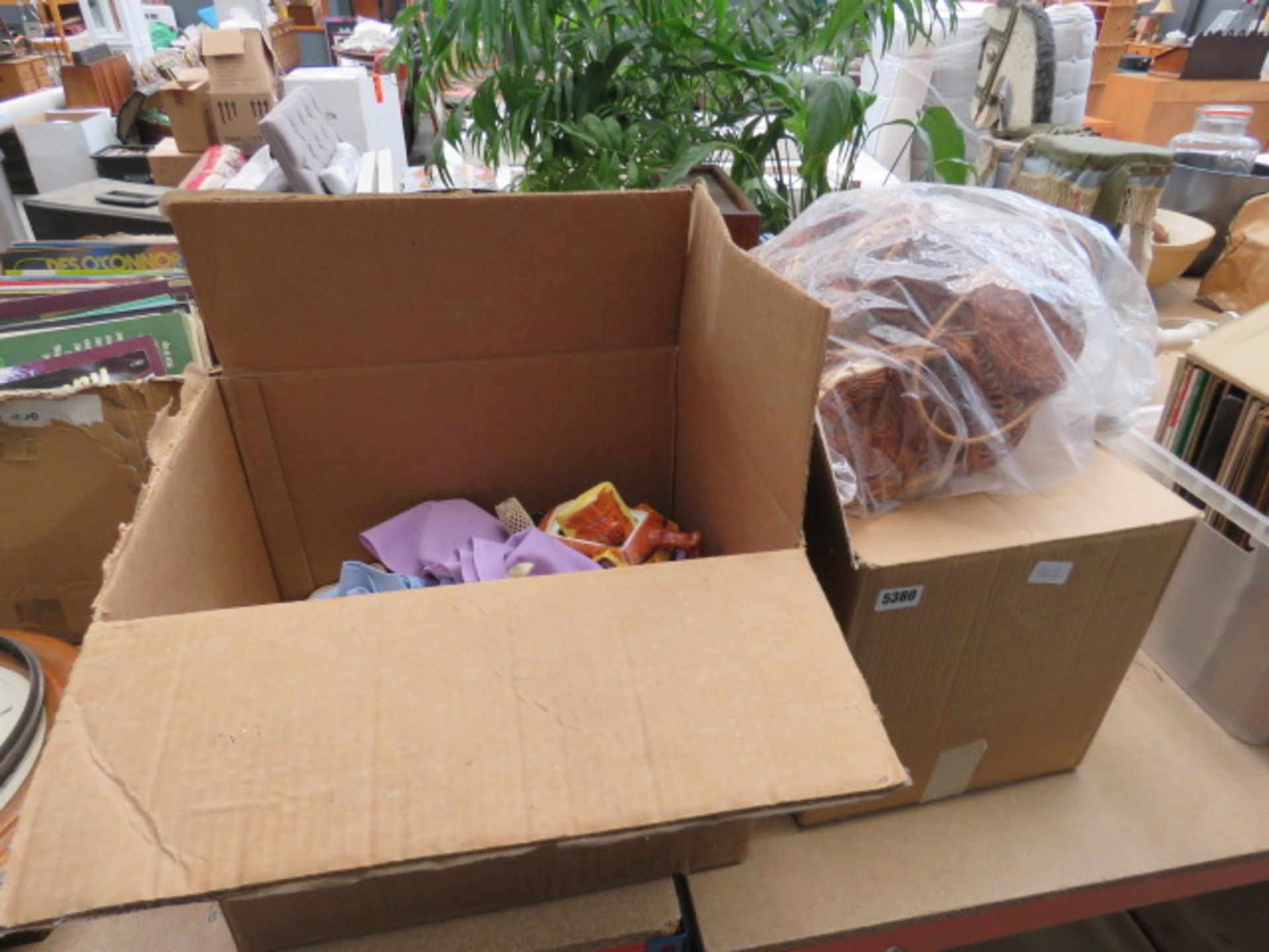 3 boxes and bag containing mini wicker baskets, quartz clock, ornamental ship, and crockery