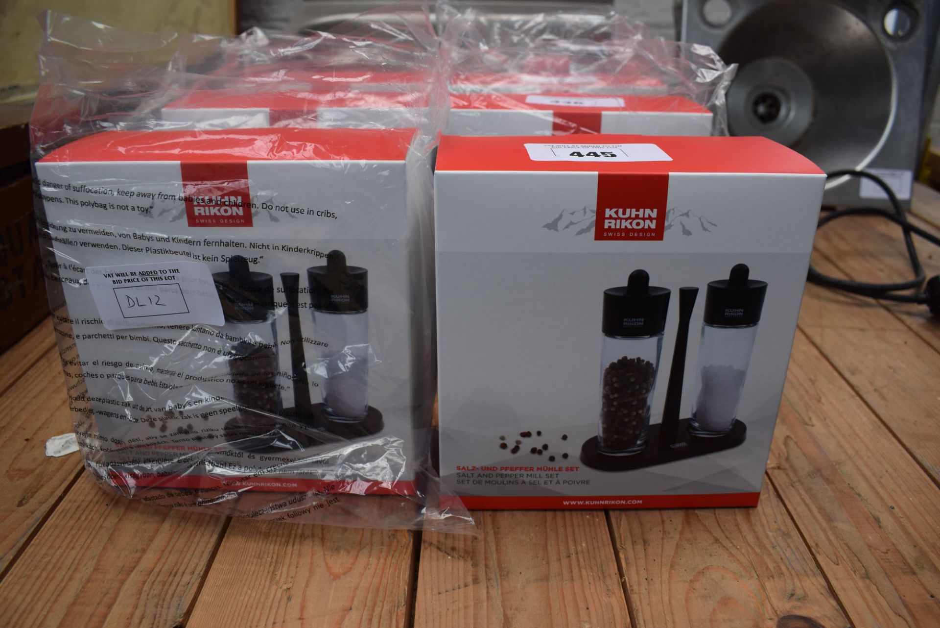 2 Kuhn Rikon salt and pepper mill sets