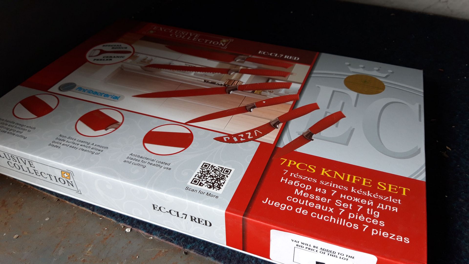 (391) Set of 7 Exclusive Collection red coated knives in box