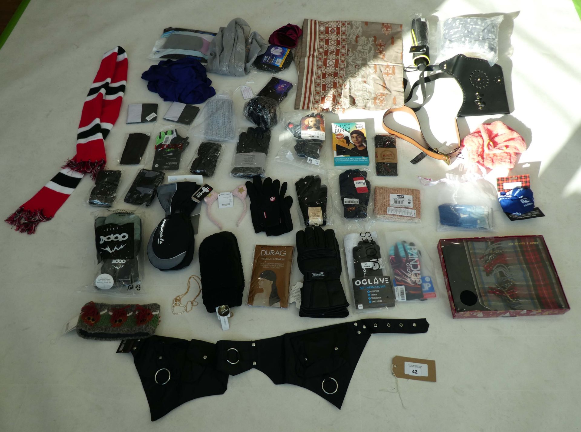 Selection of accessories to include gloves, scarfs, etc