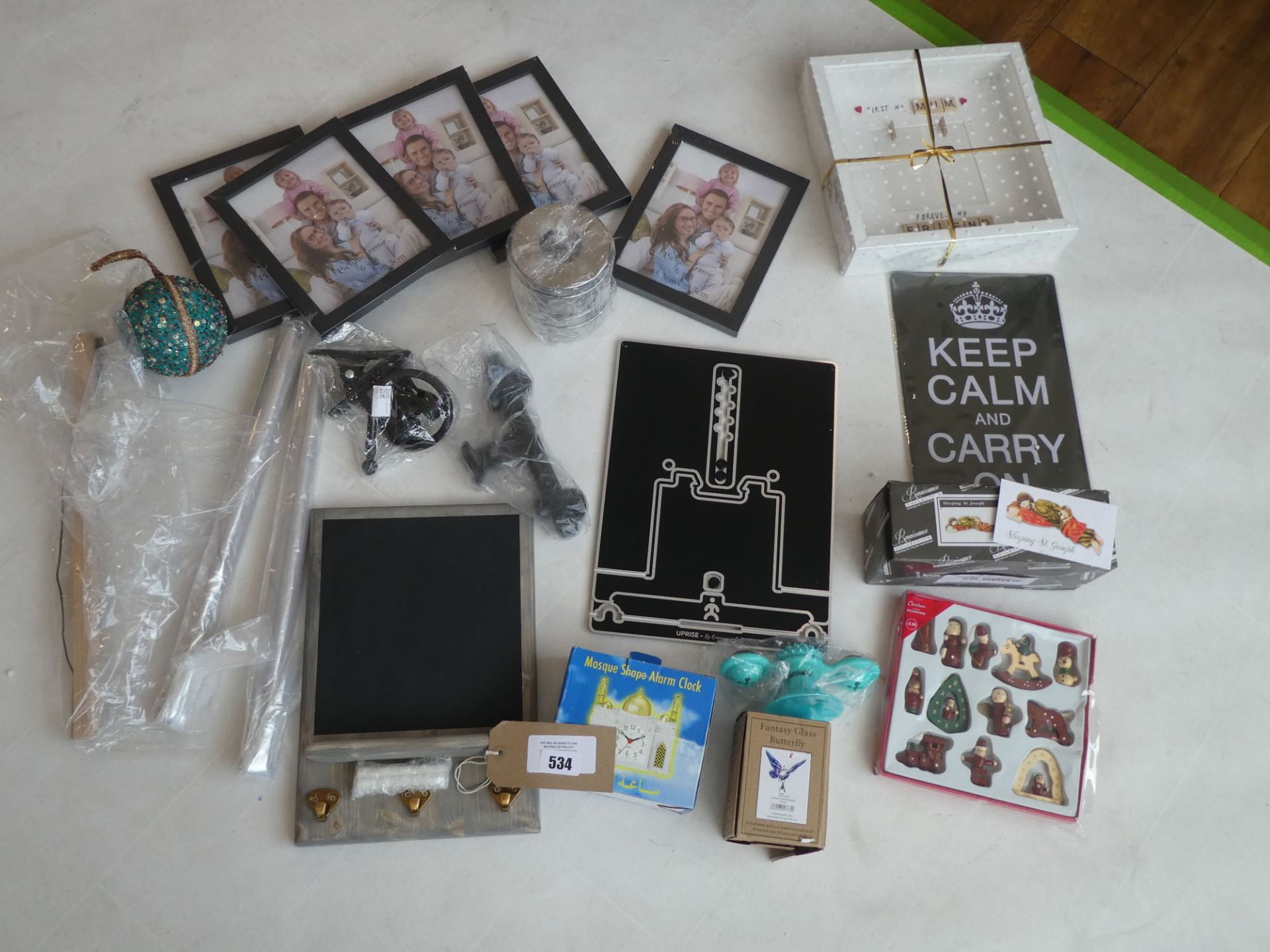 Selection of items including photo frames, chalkboard, sleeping St Joseph, glass butterfly etc