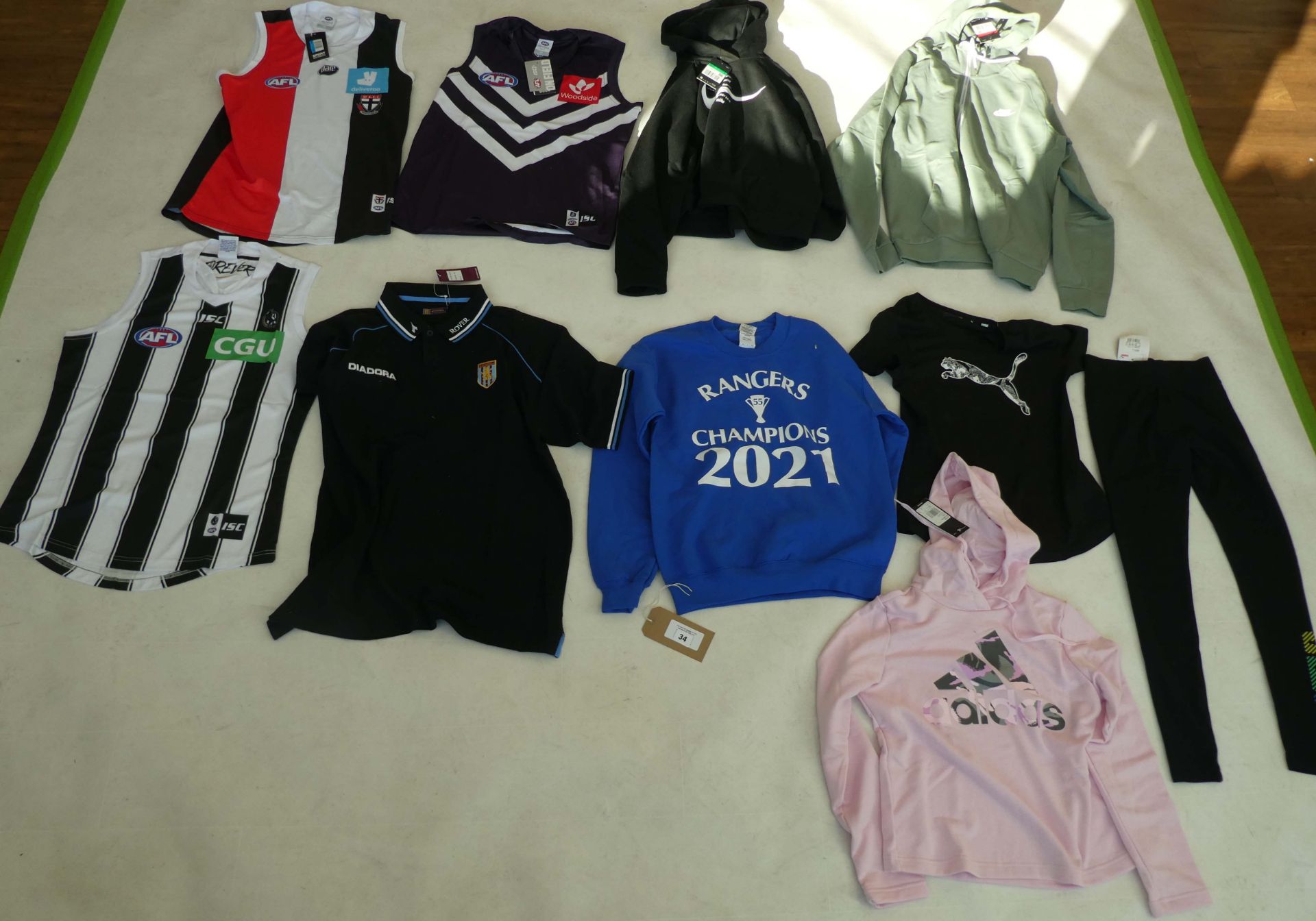 Selection of sportswear to include Nike, Puma, On Field, etc (sizes on 2nd photo)