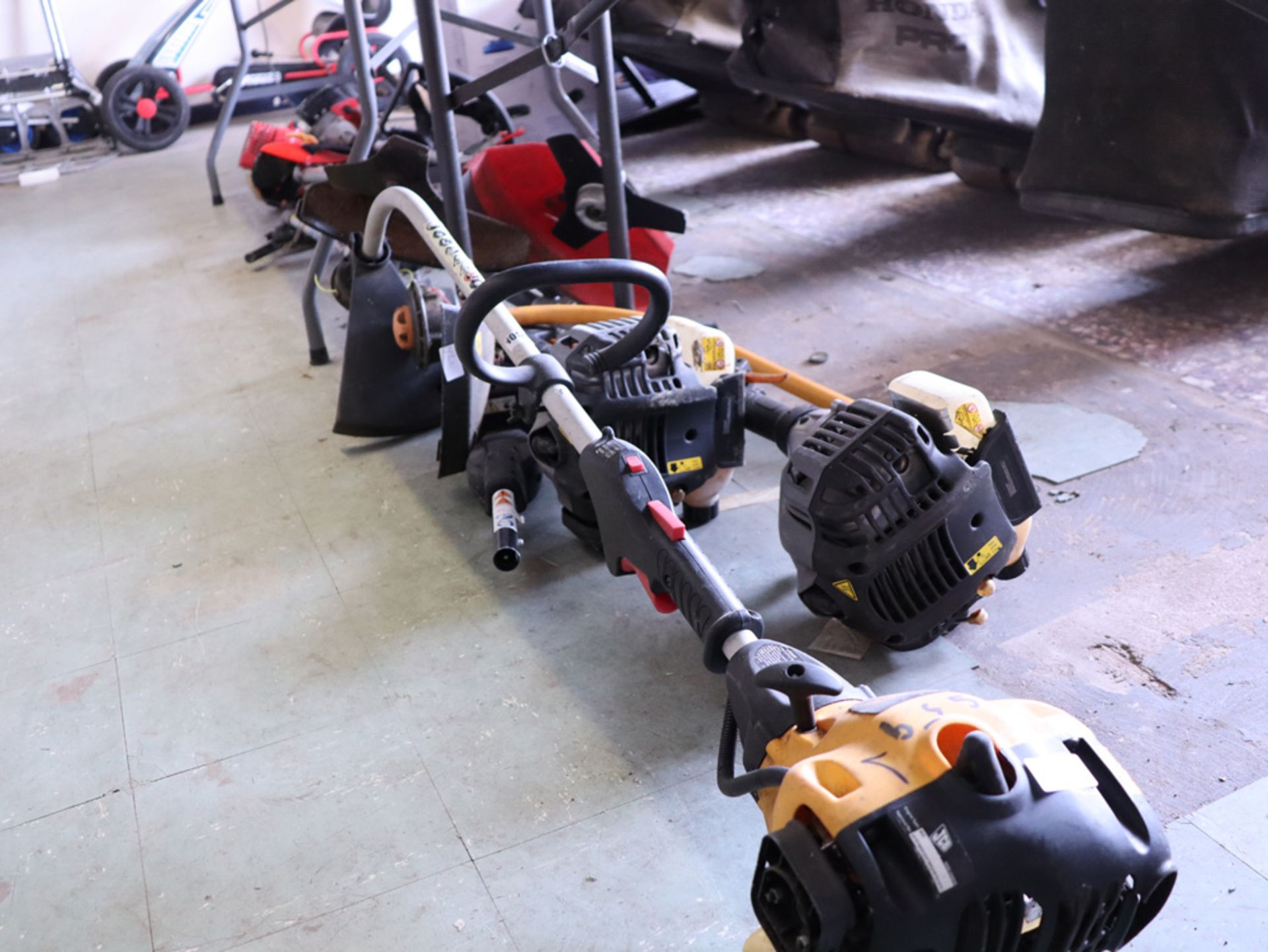 2 under bays of mixed petrol engine strimmers and brush cutters with various loose components - Image 2 of 2