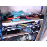 2 small shelves of car cleaning accessories, wiper blades and frost blockers
