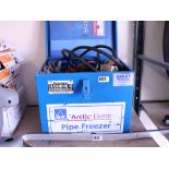 Cased Arctic electric pipe freezer