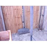 Large plastic garden rake, pick axe and hammer