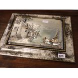 Metal relief picture of harbour town in ornate frame