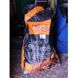 Part bag of charcoal briquettes