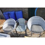 2 round garden armchairs and 2 smaller grey rattan garden chairs