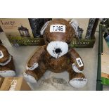 Brown leather teddy bear doorstop
