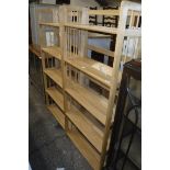 Pair of open front rubber wood bookcases
