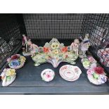 Cage with ornamental posies, figures and a dish