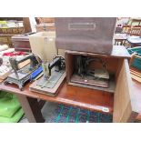 Three vintage sewing machines