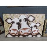 Comical modern wall hanging with 3 calfs