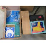 4 boxes containing 8mm film, camera, and accessories