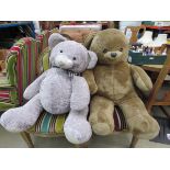 Two large teddy bears