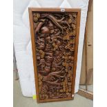 Large carved wooden African panel