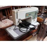 Singer electric operated sewing machine, no plug *Collector's Item*