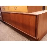 Mid century teak low level unit with double sliding doors