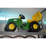 Child's ride on pedal tractor