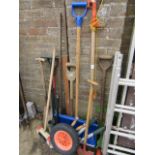 Quantity of various garden tools incl. brush, shears, spade, tree lopper, edged, spare wheelbarrow