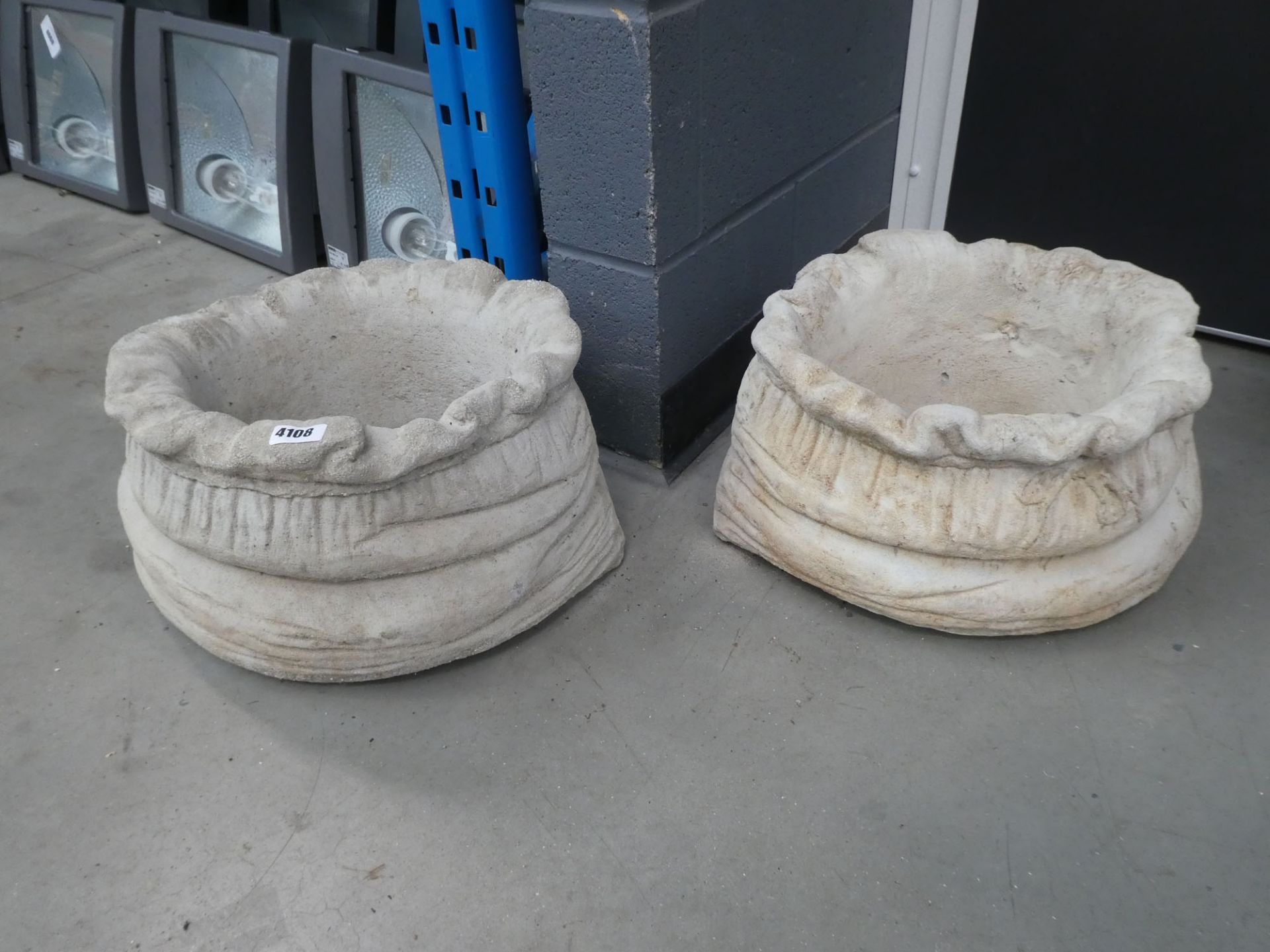 2 sack style concrete pots