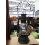 Oil lamp with swing handle