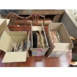 3 boxes containing 78 records and 7'' singles