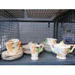 Cage with a qty of Meadowland floral pattern crockery