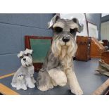 Two resin figures of schnauzers