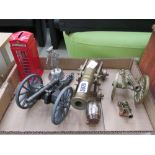 Box of ornamental cannons and a telephone box