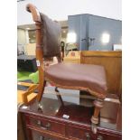 Nursing chair with brown rexine seat and back