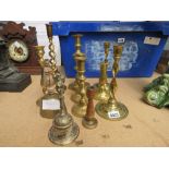 Ten 19th century and later brass candlesticks and bells